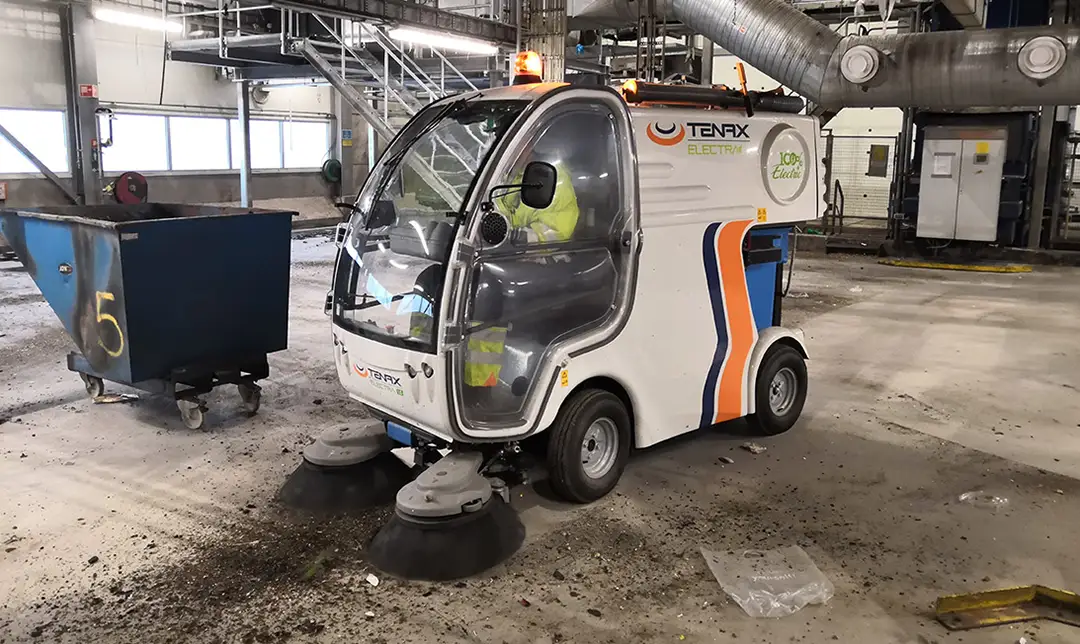 The Tenax Electra 1.0 electric street sweeper parked indoors